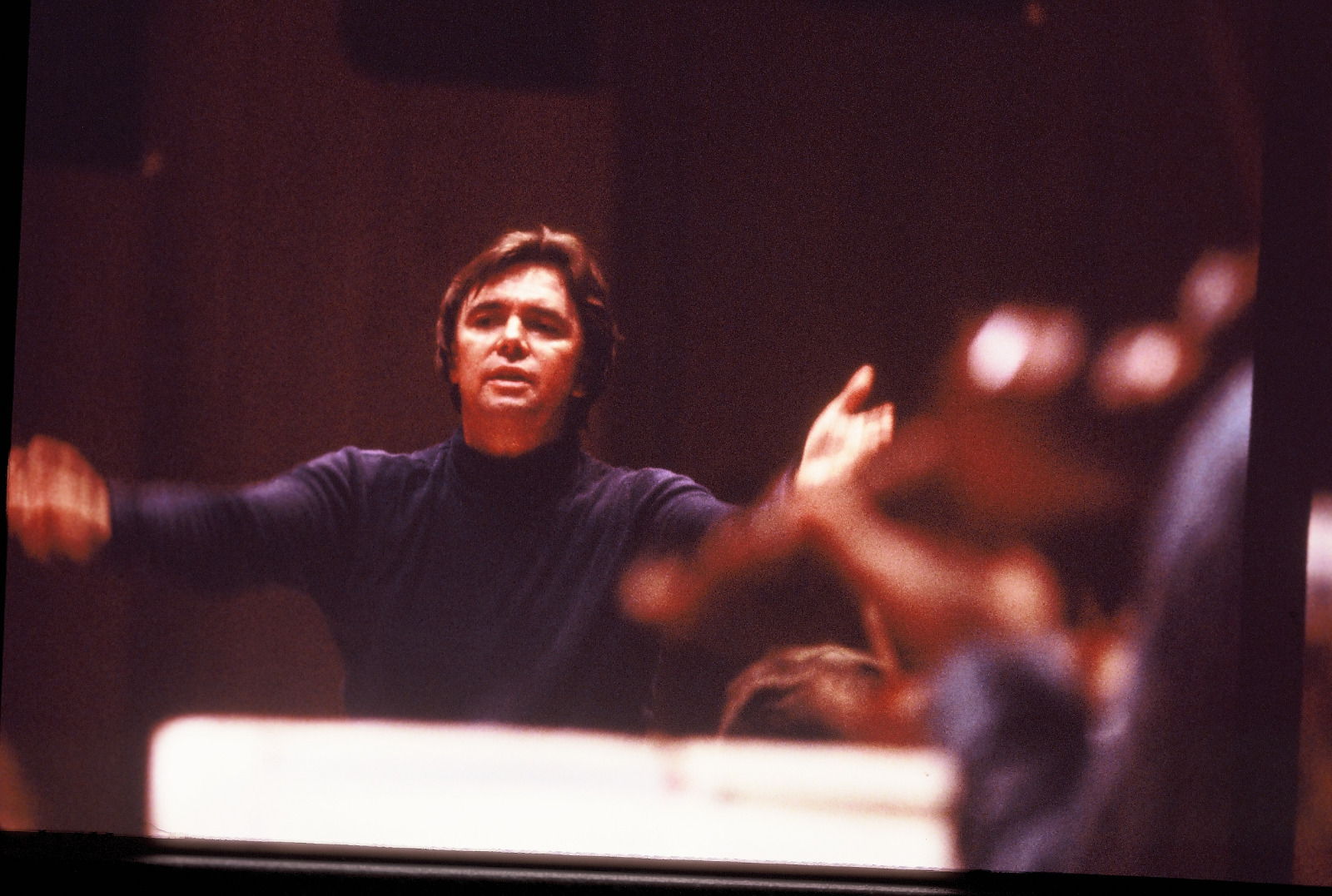 Paul conducting