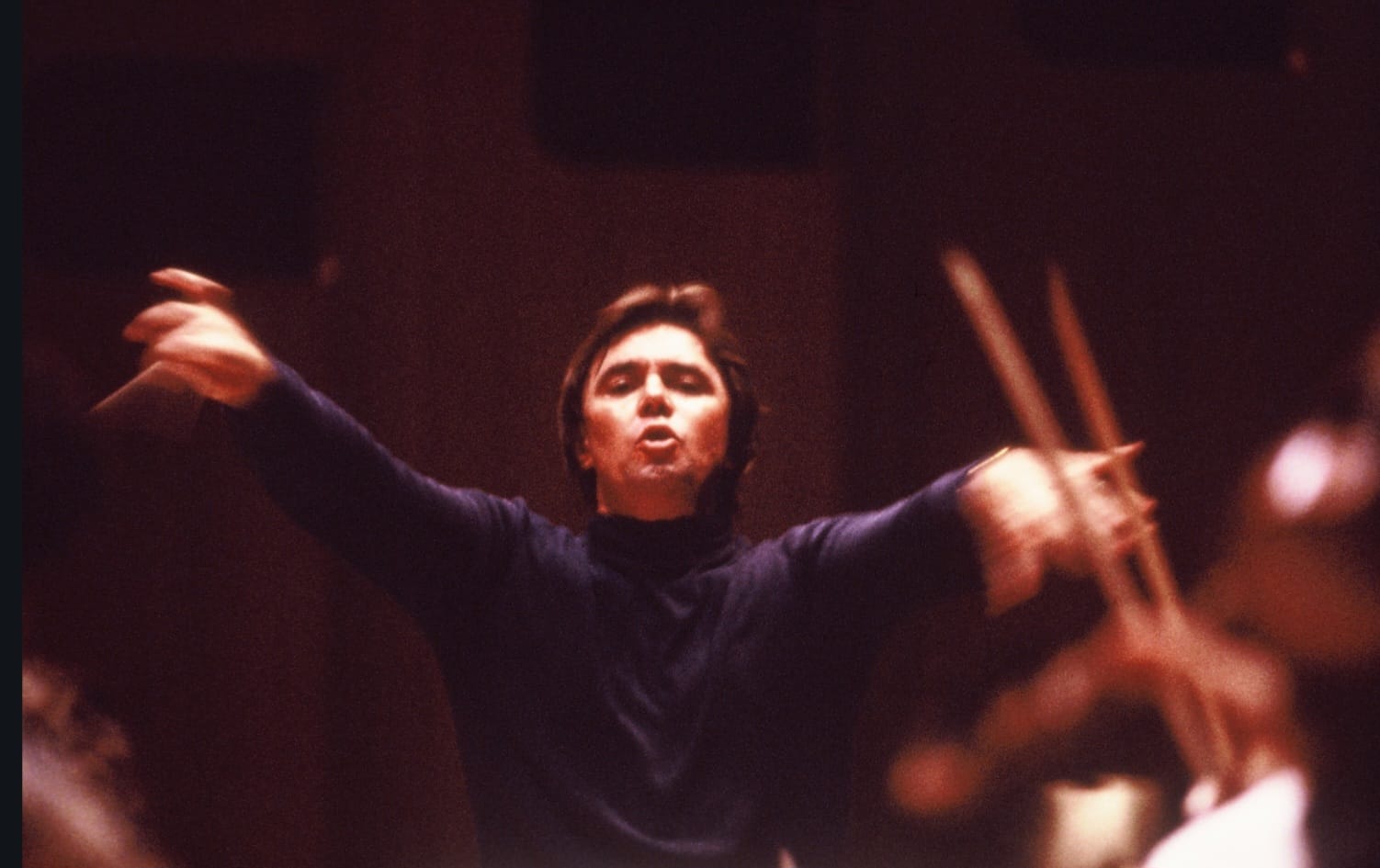 Paul conducting